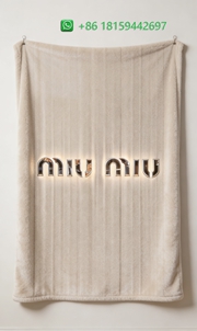 Miumiu Throw Blankets